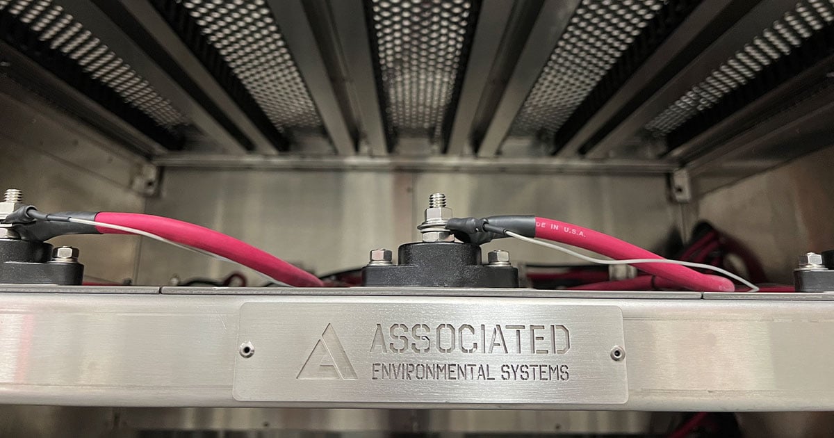 A close up of the AES logo on a custom environmental chamber