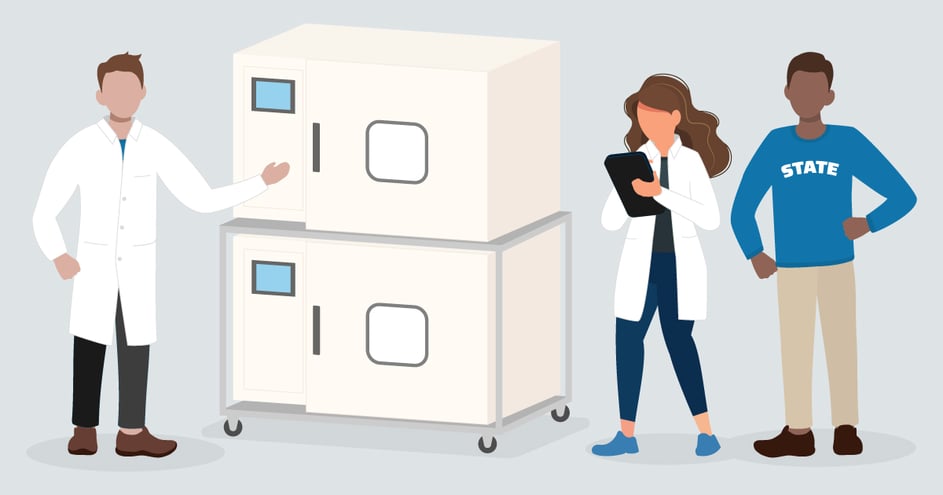 An illustration of three people looking at two stacked test chambers. Two of them are wearing lab coats. The third is wearing a college sweater.