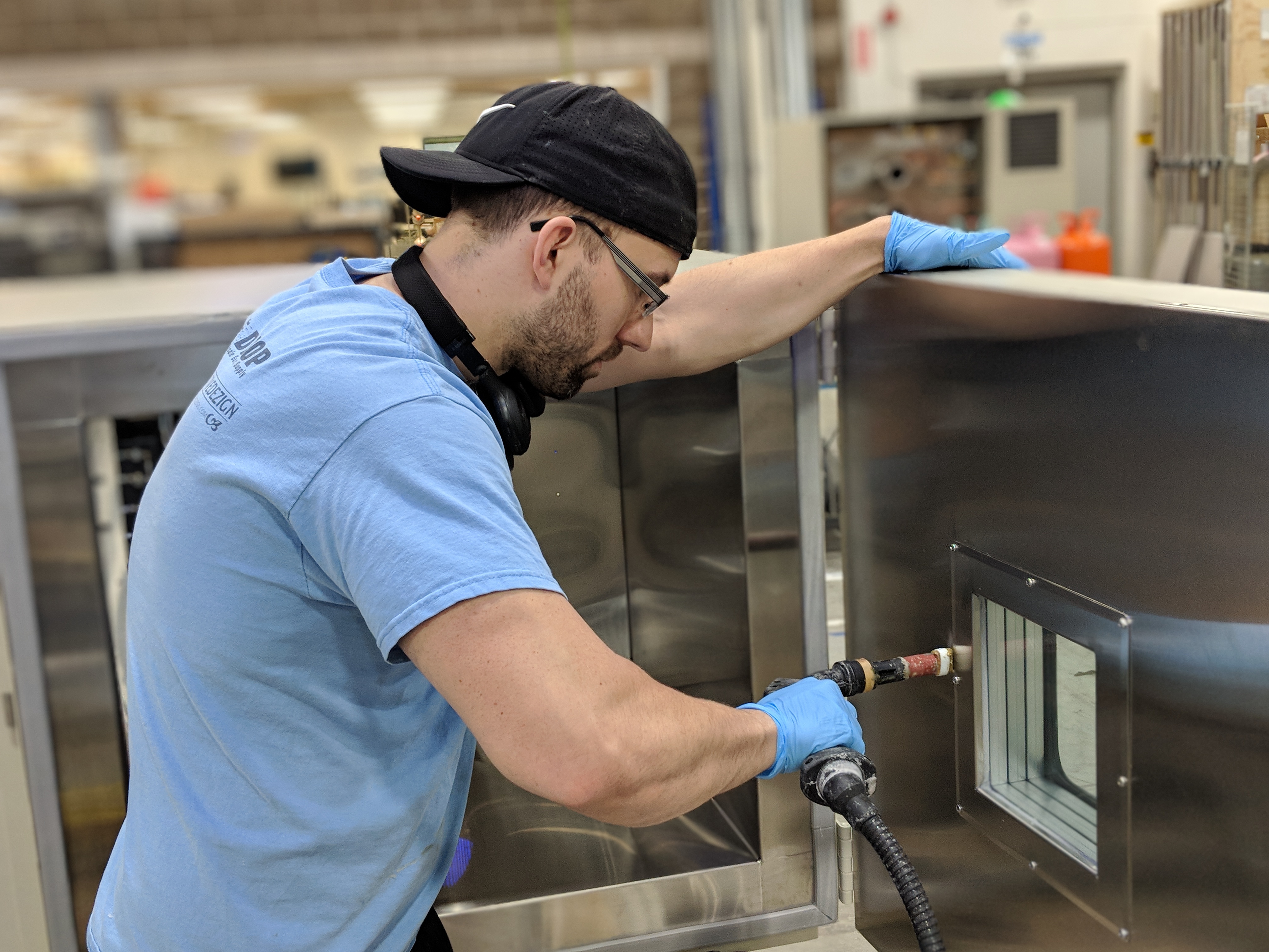 Technician assembling a test chamber