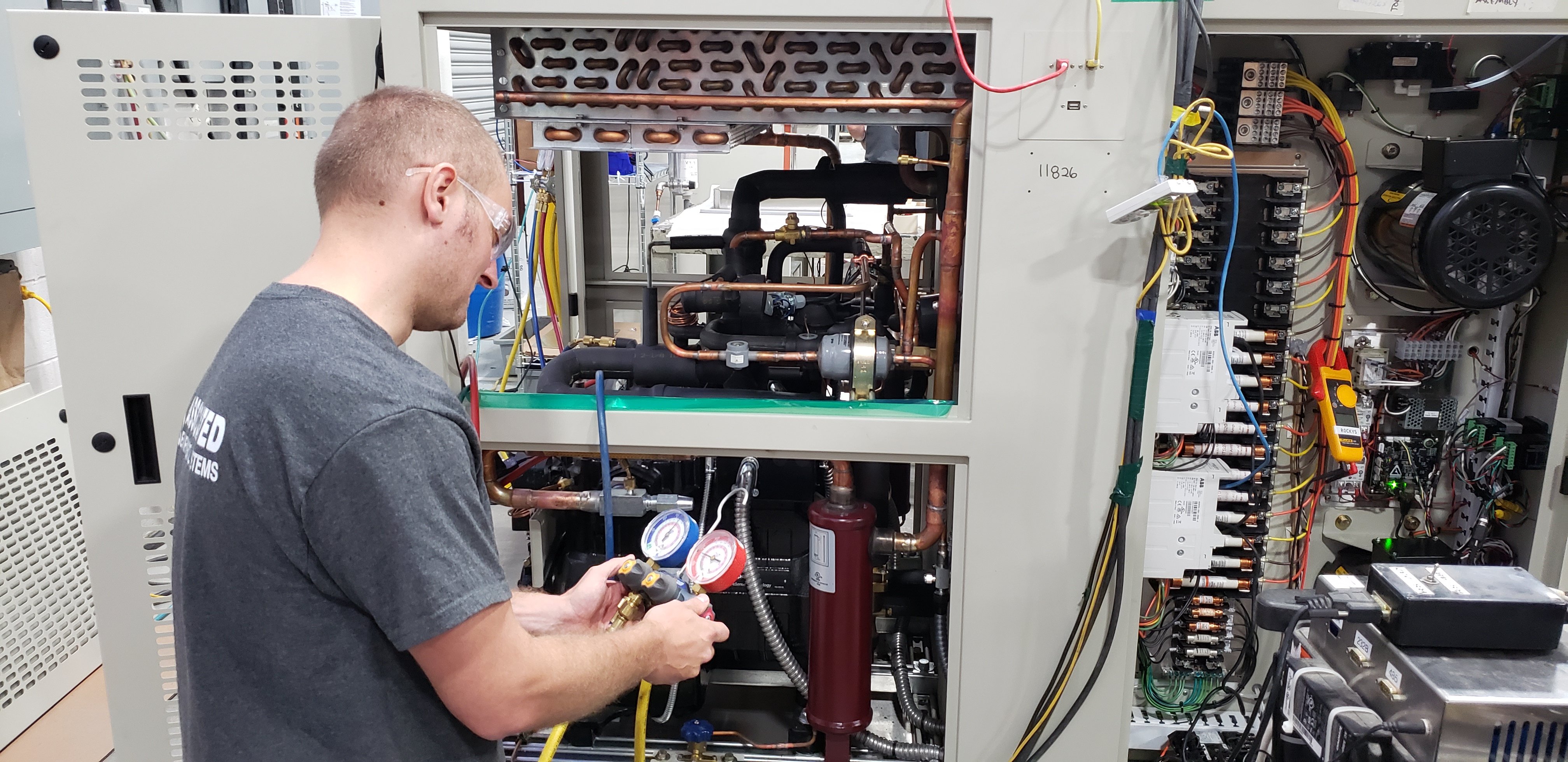 Technician evaluating test chamber